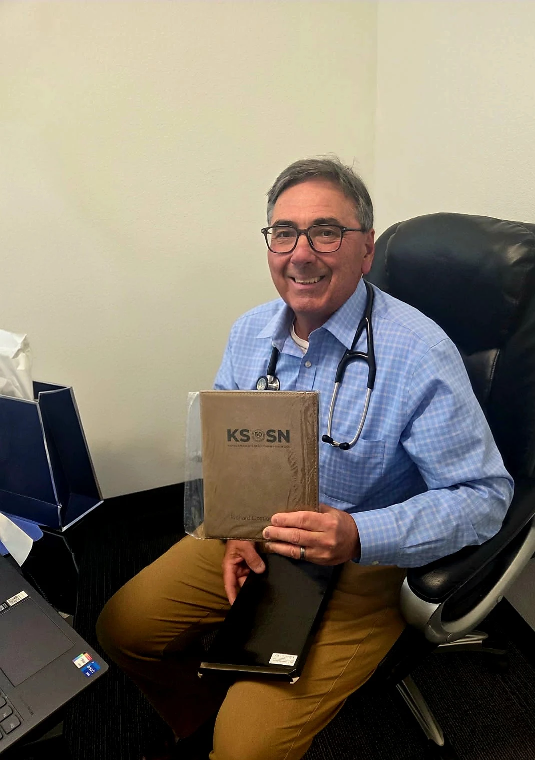 Doctor holding a gift